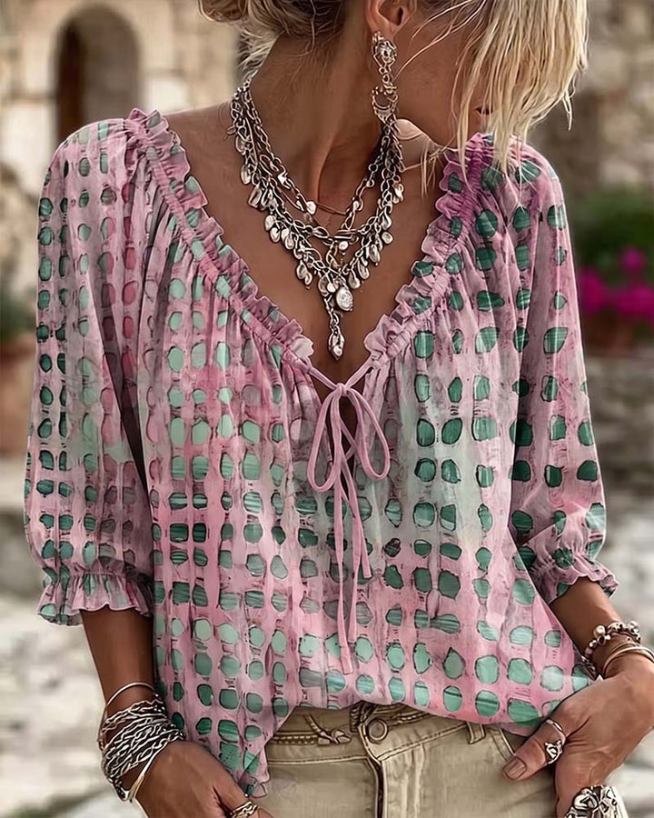 Lena | Blouse met stippenpatroon en vetersluiting