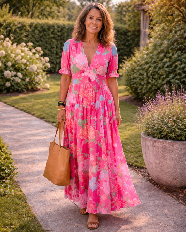 Ione | Mouwloze midi-jurk met bloemen en V-hals