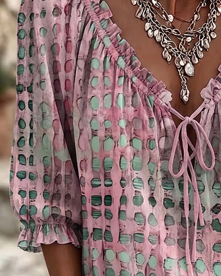 Lena | Blouse met stippenpatroon en vetersluiting