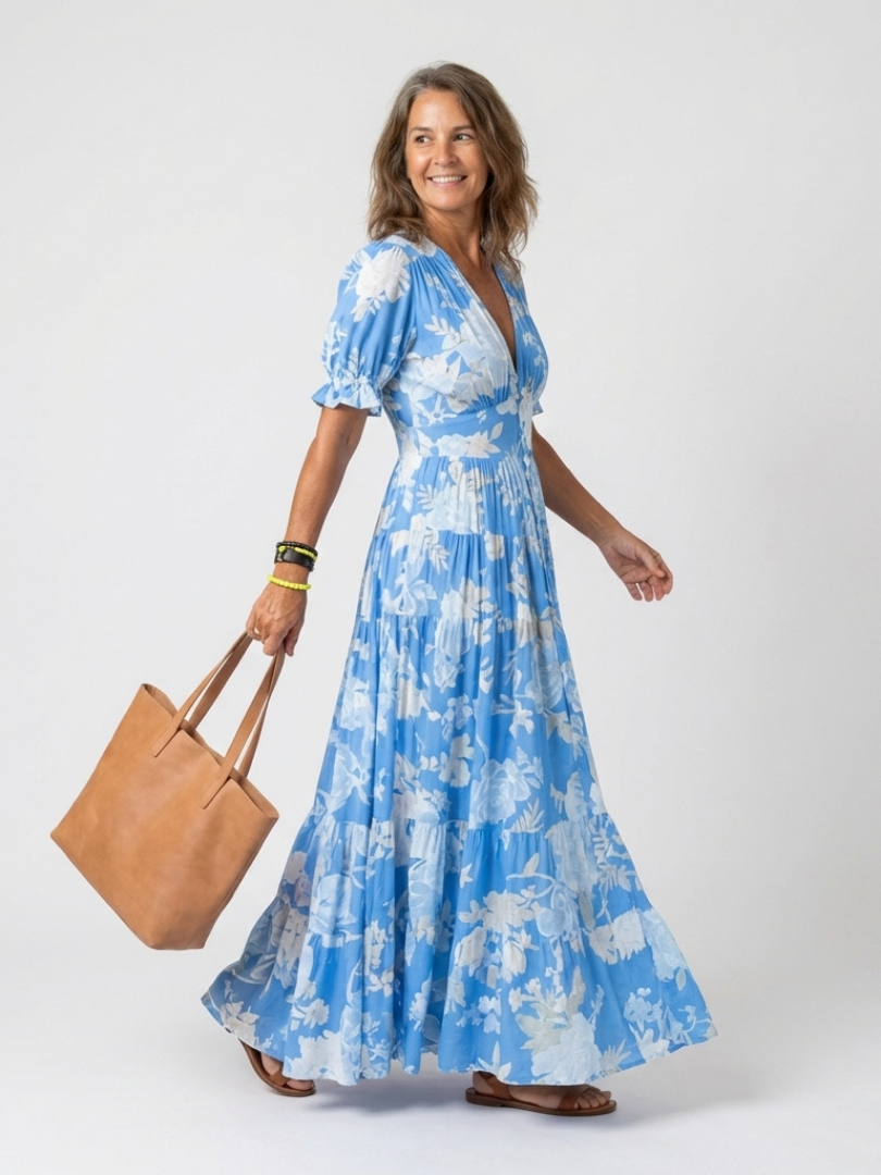 Ione | Mouwloze midi-jurk met bloemen en V-hals